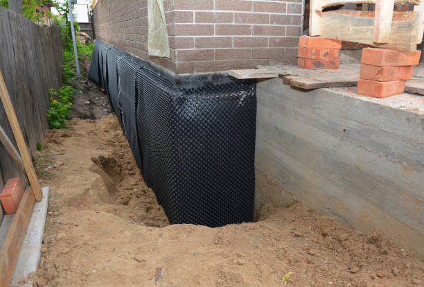 Happy homeowners after waterproofing job in Millbury